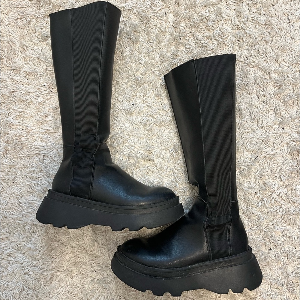 Tall black boots